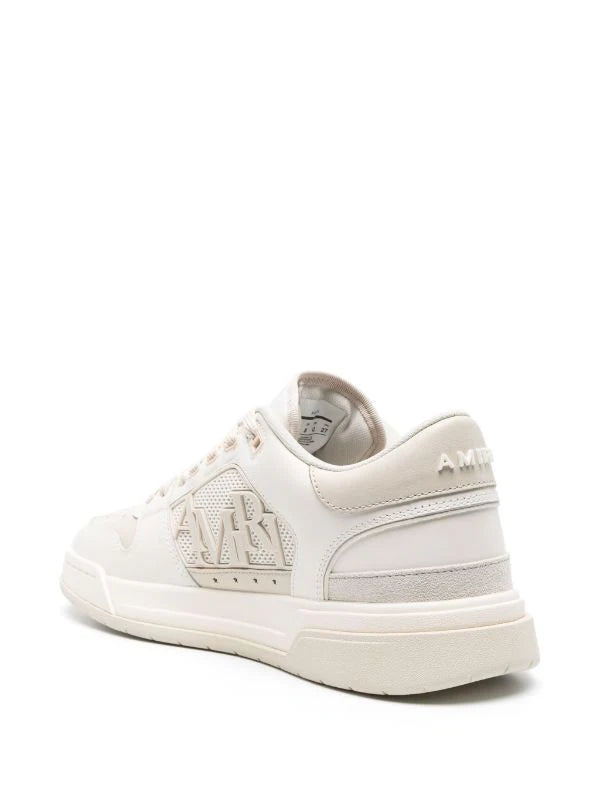 AMIRI logo-embossed leather sneakers - shoestation44